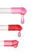 © Tatjana - 3 color dripping lip gloss applicators, isolated on white  background