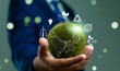 © GamePixel - World environment day, Responsibility for a green planet, Sustainable growth, and global conservation.Businessman holding green world, Sustainable development goals and corporate social responsibility