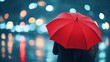 © Arfa_Media - Couple sharing red umbrella during romantic rainy night in the city