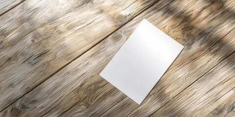 Poster - blank white flyer rests on textured wooden surface, illuminated by soft natural light, creating serene and inviting atmosphere