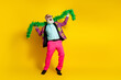© deagreez - Full length portrait of crazy grandfather dance hold hawaii necklace wear pink pants blazer empty space isolated on yellow color background