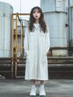© Ryzhkov - Urban Street Style Asian Woman in Oversized Shirt Dress and Chunky Sneakers
