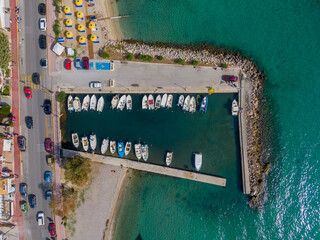 Wall Mural - Beautiful beach in Ipsos on Corfu, tourists enjoying a nice summer day at the beach. Greece