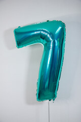 Wall Mural - green foil number 7 with helium for birthday