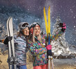 © Ljupco Smokovski - Female friends with ski equipment taking a selfie with a smartphone