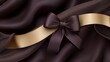 © Qory - Elegant Brown Silk Bow and Ribbon on Luxurious Fabric Background