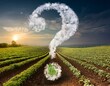 © Tedi S Photography - Large question mark made of clouds over rows of agriculture fields in the background