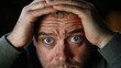 © InspirationDesign - Man with shocked expression holding head. Perfect for stress, surprise, or crisis reaction content.