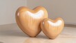 © Wild Dream - Minimalistic polished wooden hearts in natural shades displayed on marble surface for valentine's day home decor