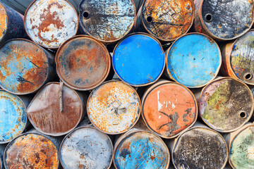 Wall Mural - scenic view of old metal barrels in a port