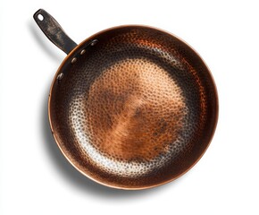 Wall Mural - Top view of a hammered copper frying pan with a dark wooden handle, isolated on white.