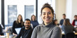 © plysuikvv - Group of young professionals engaged in a collaborative workspace