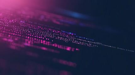 Close-up of glowing computer code on a screen.