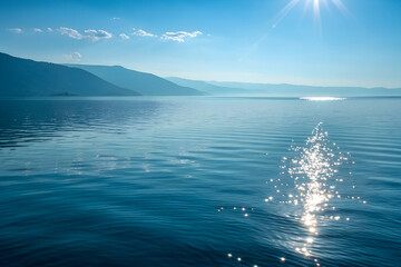 Wall Mural - Sunlight Sparkling on a Calm Blue Water Ripple Surface