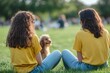 © senyumanmu - Girls Sitting in Grass with Dog