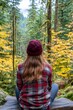 © senyumanmu - Woman Contemplating Autumn Forest View