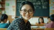 © kiki__ - Smiling Teacher in Classroom