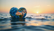 © Alex_Kalin - Earth in heart shape floating in ocean at dusk, love for nature
