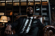 © AlfredoGiordano - close up horizontal portrait image of a successful black businessman seated in his office