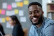 © Prime Look - Happy black businessman and his coworkers analyzing mind map during meeting at casual office. Generative AI