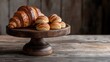 © si9nzation - Golden croissants and pastries on rustic wood