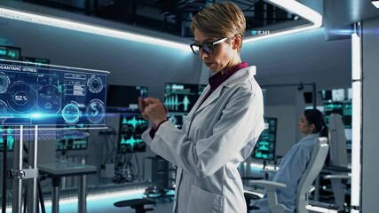 Fototapete - Scientist analyzing data in a modern laboratory with advanced technology during a research session