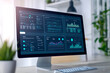© F-STUDIO - A sleek computer monitor displays various data analytics and statistics in a modern workspace filled with greenery.
