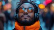 © LifeMedia - Man enjoying music outdoors in vibrant city atmosphere