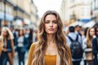 © Robbie Smith 1  - Confident woman standing out in a busy urban crowd on a city street