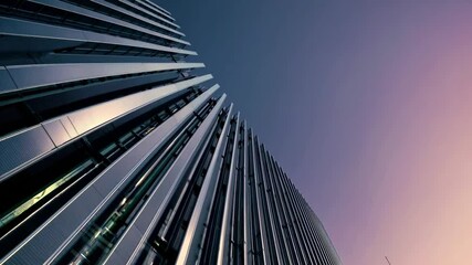 Poster - Modern architectural marvels at sunset showcasing sleek lines in an urban skyline
