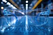 © Graph Squad - Clear safety glasses rest on a perforated metal surface, industrial background blurred.