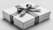 © Andrey - A beautifully wrapped white gift box topped with a sleek grey ribbon, perfect for any occasion. Its simplicity highlights understated elegance and professionalism.