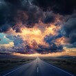 © Володимир Дубецький - Dramatic sunset over an empty highway with vibrant clouds and serene landscape in the distance