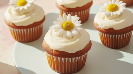 Wall Mural - Cupcakes with white frosting and yellow daisy petals