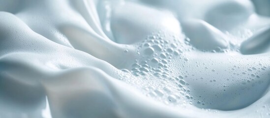 Canvas Print - close-up of smooth white fabric with water droplets and bubbles on a textured surface copy space