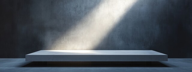 Wall Mural - minimalist display table with dramatic lighting and gray textured background copy space for product 