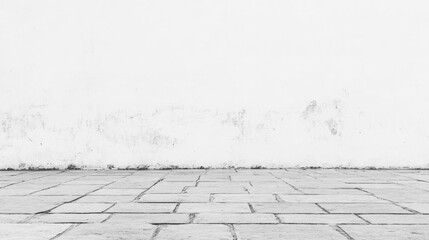 Wall Mural - empty white wall with textured surface and stone floor, minimalistic background with ample copy spac
