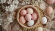 © buraratn - Freshly dyed eggs in pastel colors arranged in basket with straw, surrounded by delicate white flowers, creating serene and festive atmosphere