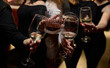 © Евгений Вершинин - Cheers to a Fantastic Celebration Friends Joyfully Toasting with Wine Glasses in Hand