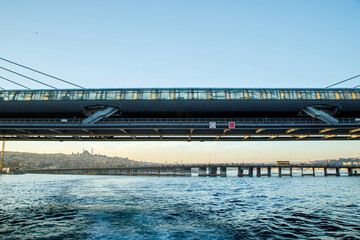 Wall Mural - sea view of metro bridge on the halic, golden horn in istanbul