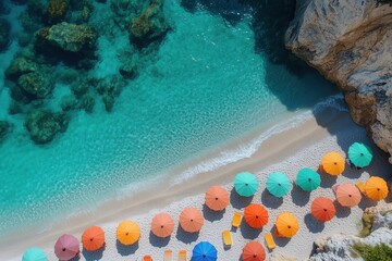 Wall Mural - Capturing an aerial view of a secluded beach, colorful umbrellas line the white sand, meeting the turquoise water in a picturesque summer paradise