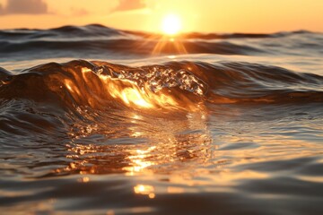 Wall Mural - Golden waves reflect sunlight during sunset over tranquil ocean waters