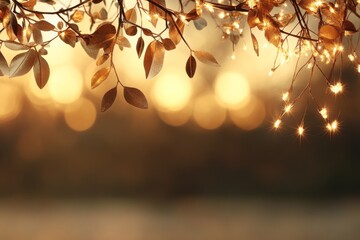 Warm golden autumn leaves glowing in soft sunset light near a tranquil body of water