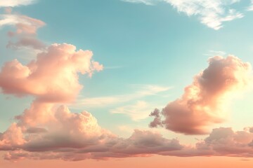 Wall Mural - Cloud formations in a vivid blue sky at sunset with soft pink and orange hues reflecting on the clouds