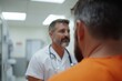 © Milos - A healthcare professional consulting an inmate in a medical facility, showcasing the crucial intersection of healthcare and the criminal justice system in a compassionate manner.