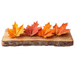 © Maina - Autumn Maple Leaves on Rustic Wooden Board with Transparent Background