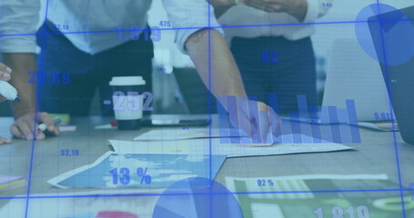 Wall Mural - image of data processing and diagrams over diverse business people discussing work
