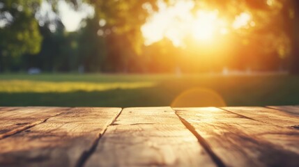 Wall Mural - Sunlight casts a warm glow over an empty wooden table in a peaceful park, inviting relaxation and contemplation on a bright afternoon