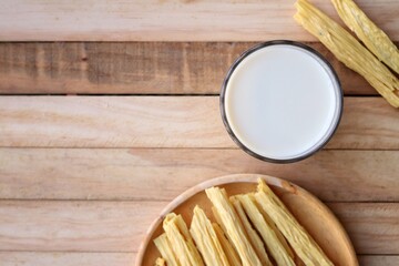 Wall Mural - Tofu milk on wood background