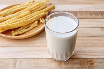 Wall Mural - Tofu milk on wood background